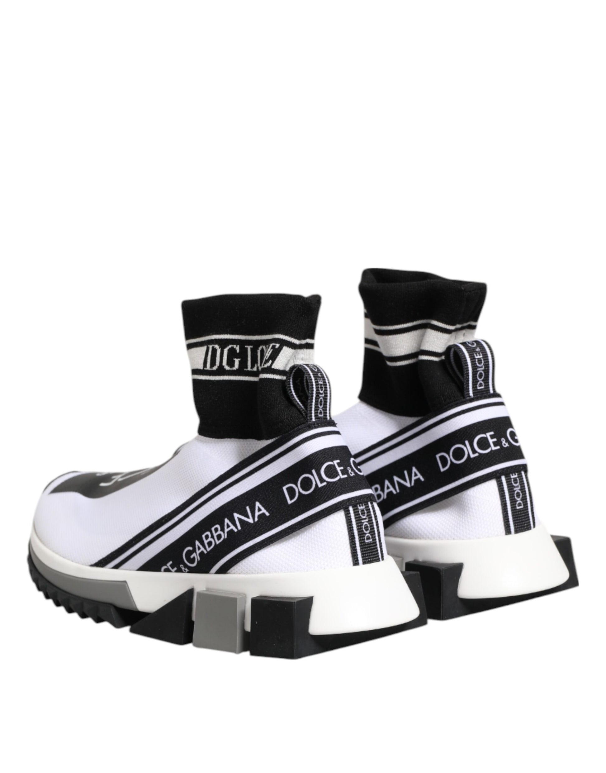 Pair of white sneakers with black stripes and brand name on side