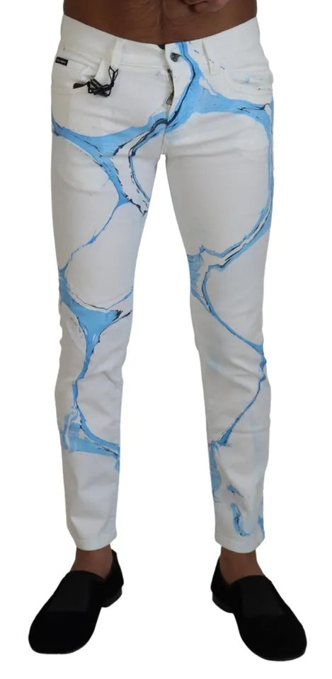 Pair of jeans with blue and white design on legs