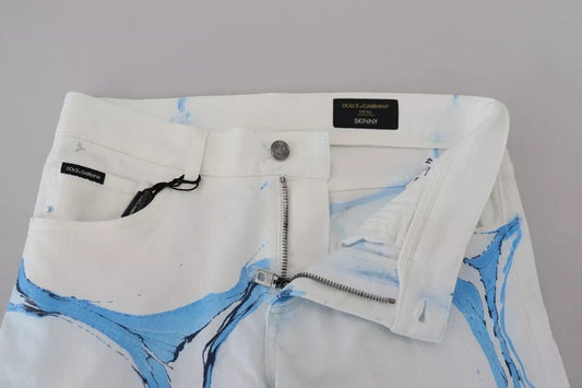 White pants with blue design on waistband