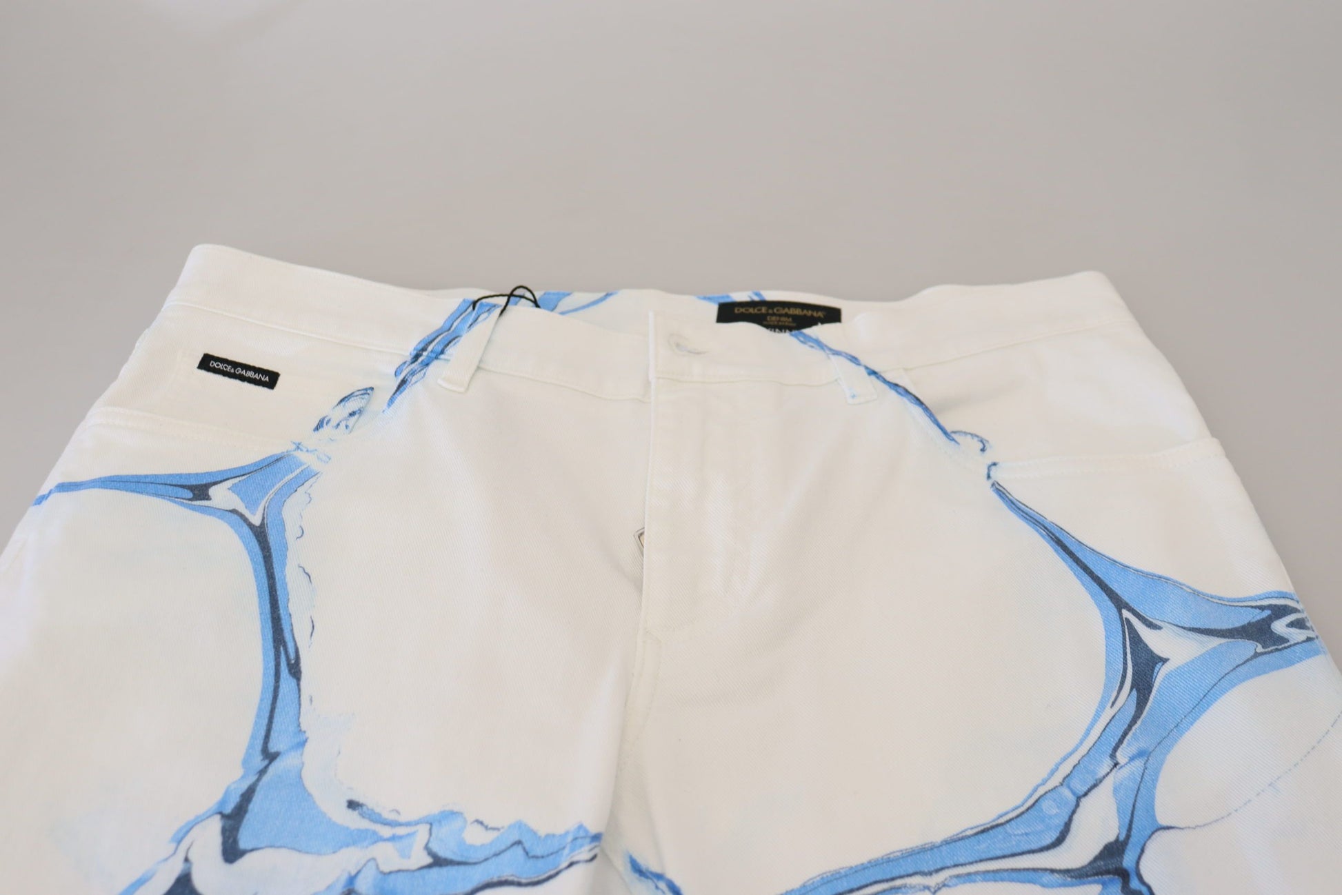 White swim trunks with blue marble print