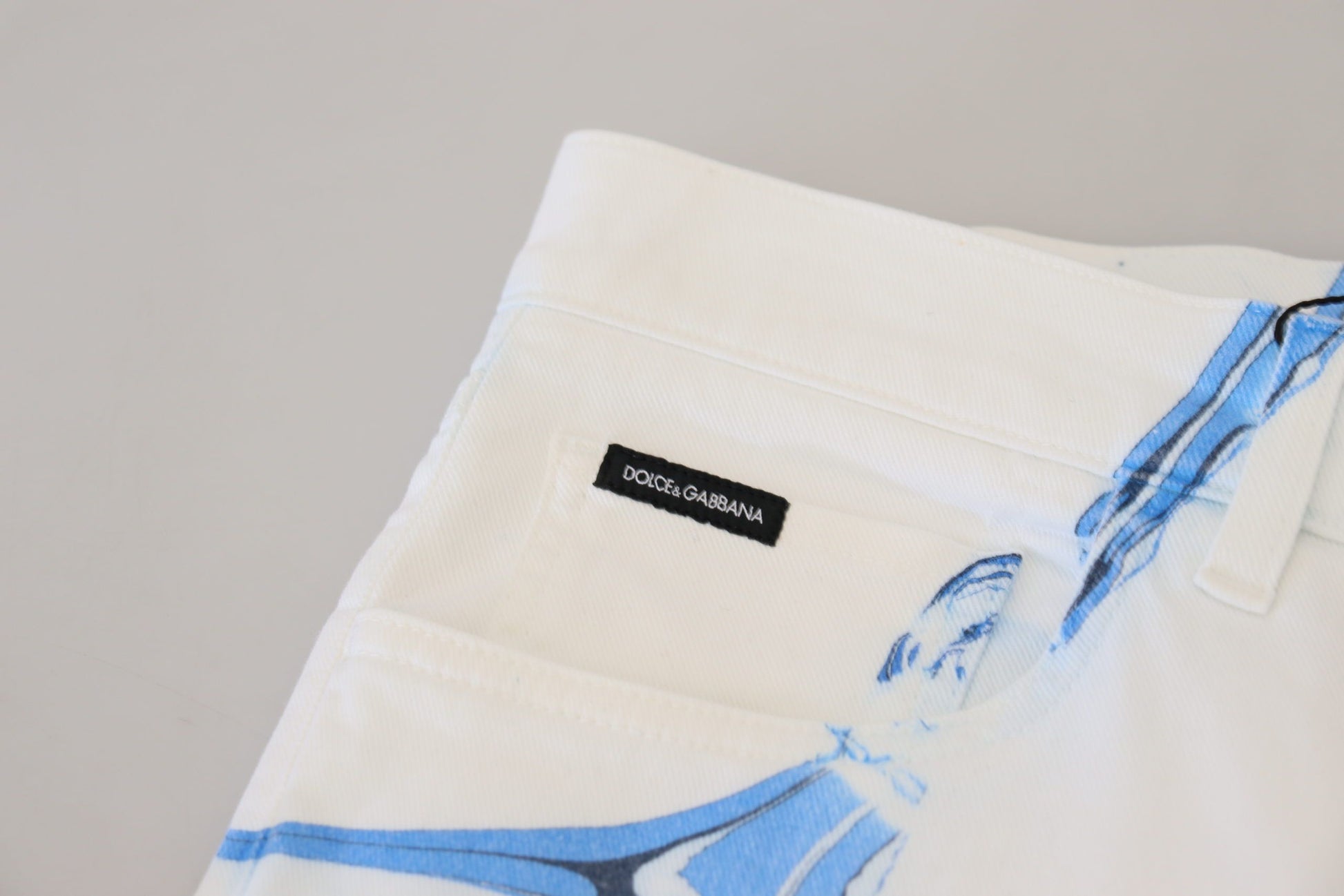 White towel with blue design