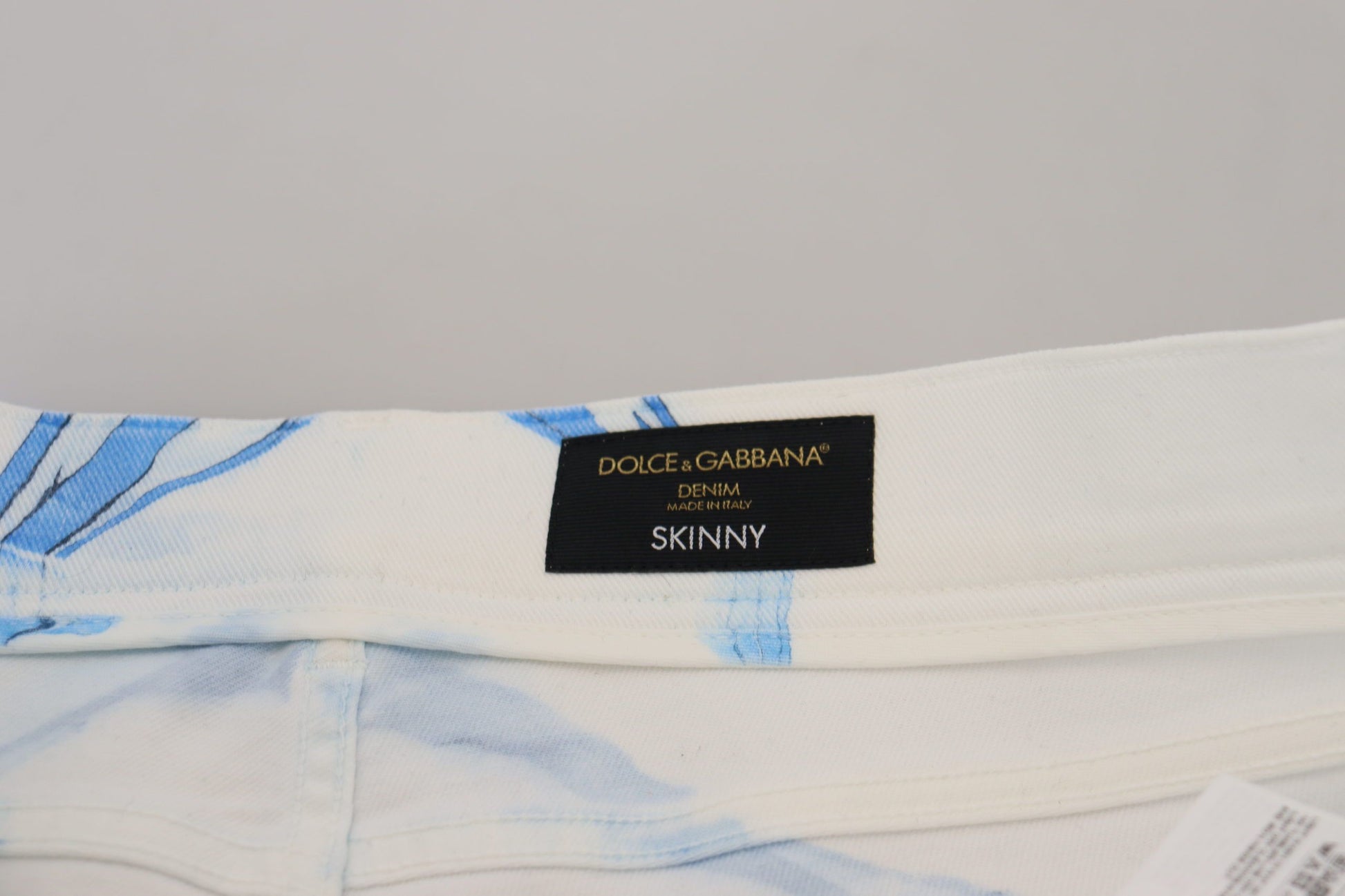 White cotton underwear with blue floral pattern and black label