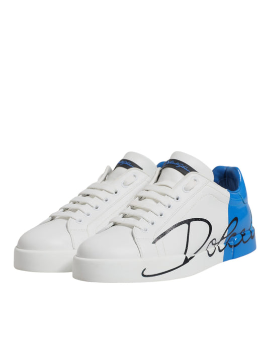 Pair of white, blue, and black sneakers with leather logo on side