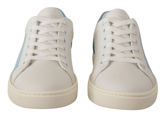Pair of white sneakers with blue laces and soles