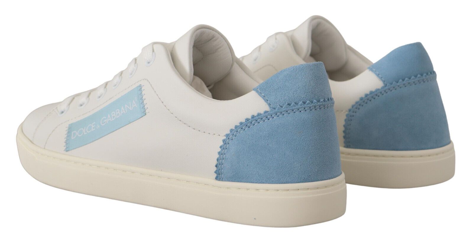Pair of white sneakers with blue accents and a logo on the side