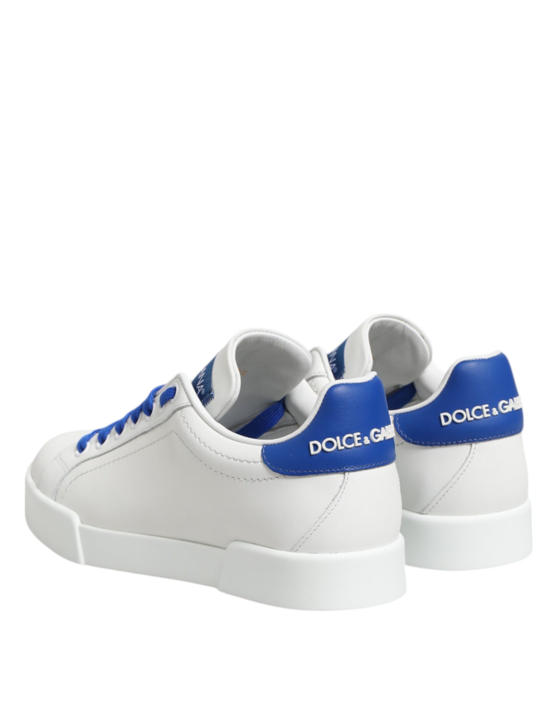 Pair of white sneakers with blue laces and soles