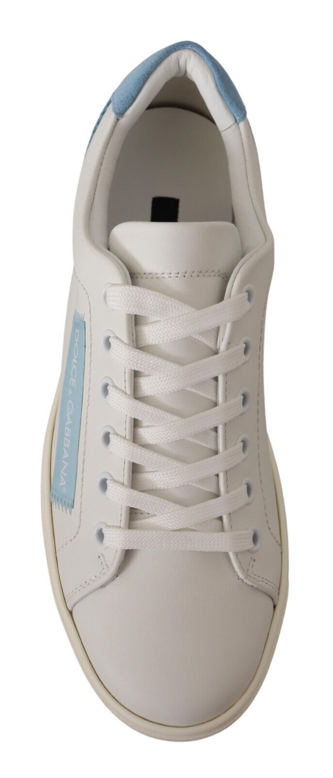 White sneaker with blue accents and white laces