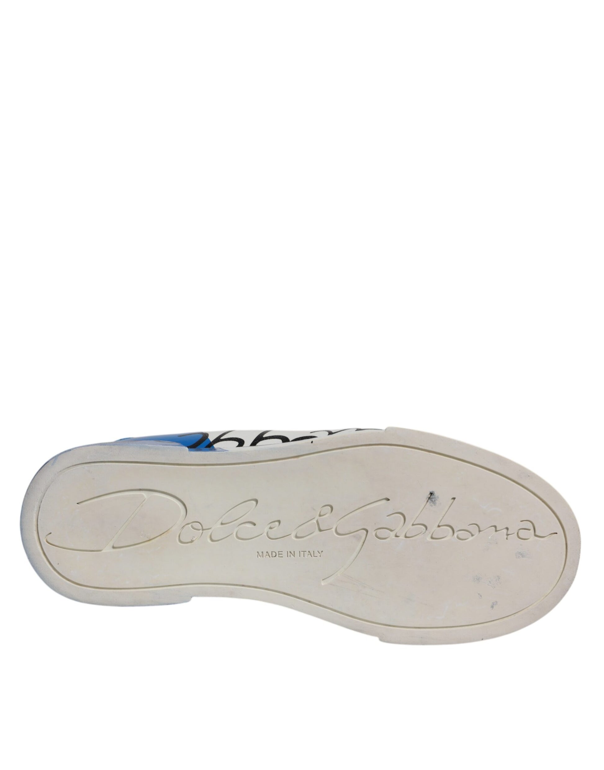 Footwear with embossed logo on sole