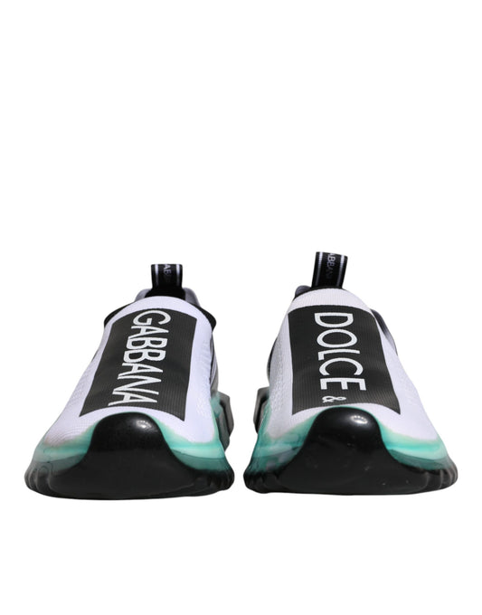 Pair of sneakers with white and black soles