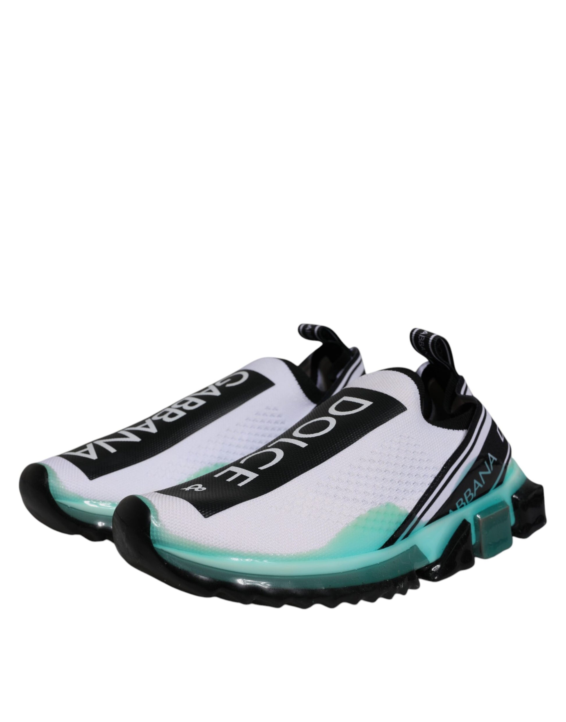 White and green shoe with black laces