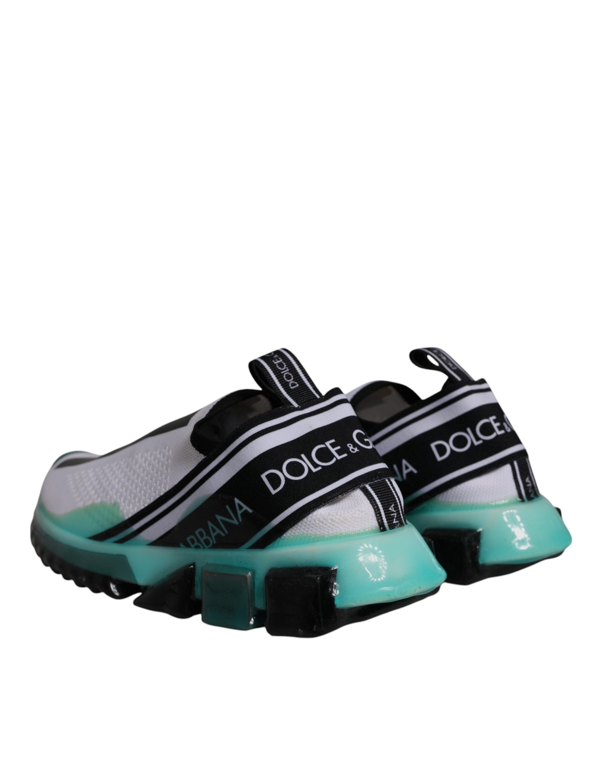 Pair of baby shoes with a black and white stripe pattern