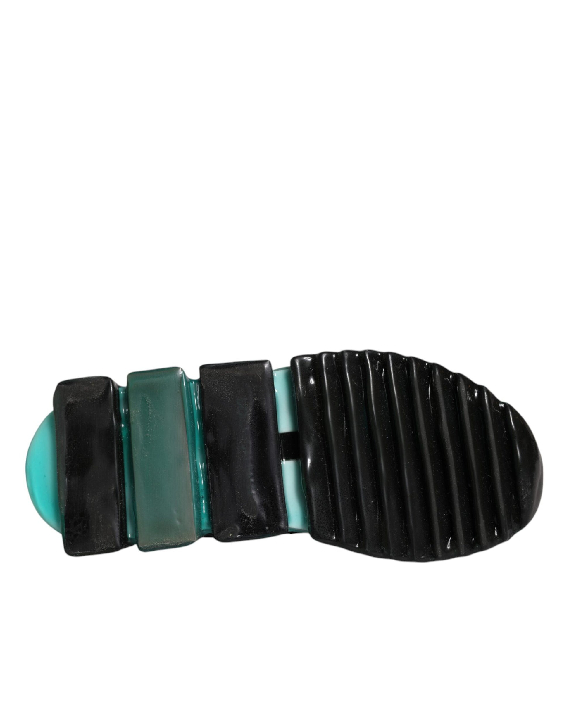 Foot massager with various colored stones and a black base