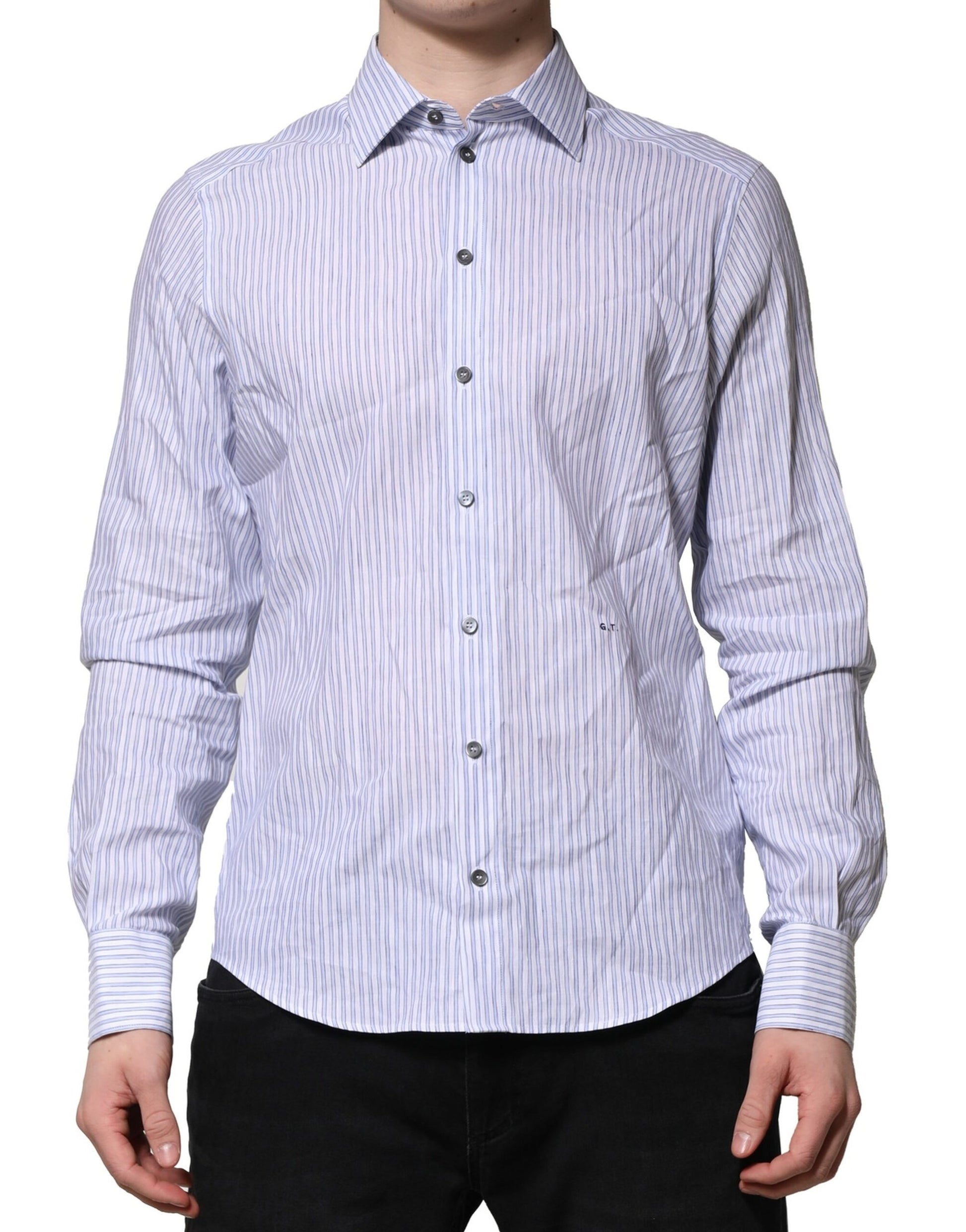 A long sleeve shirt with a striped pattern in white and blue