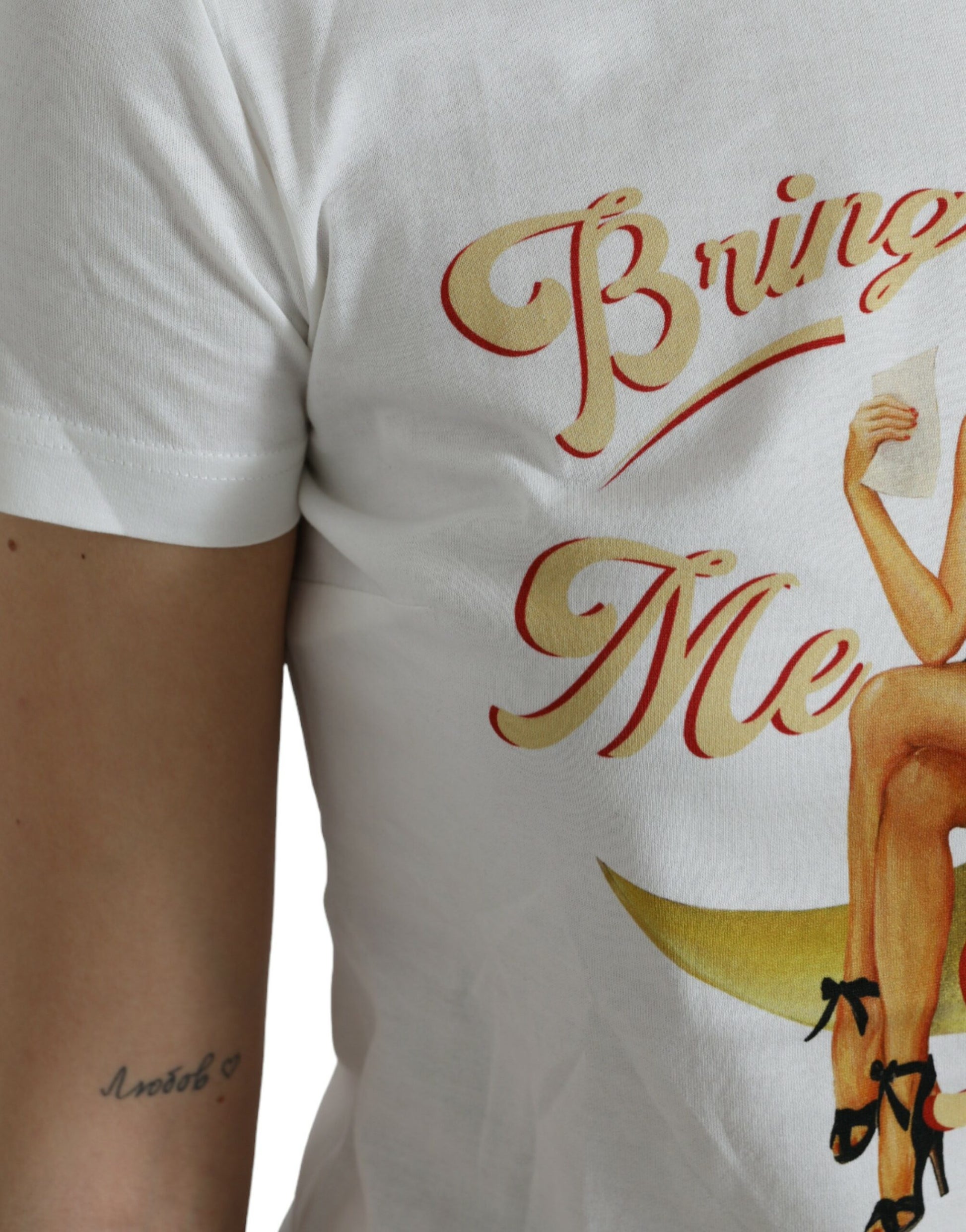 White t-shirt with graphic design featuring a woman's silhouette and text