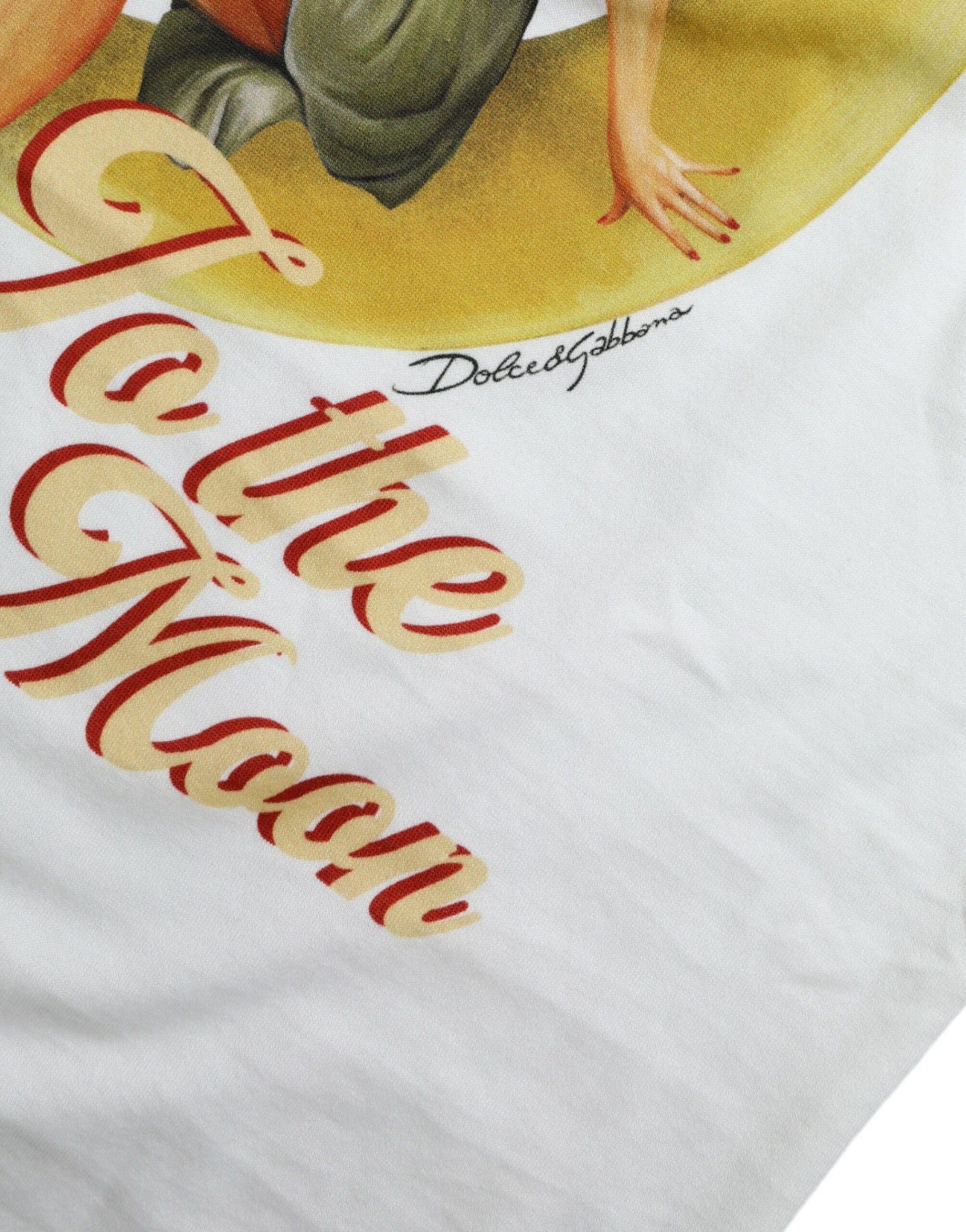 White t-shirt with red lettering and illustration