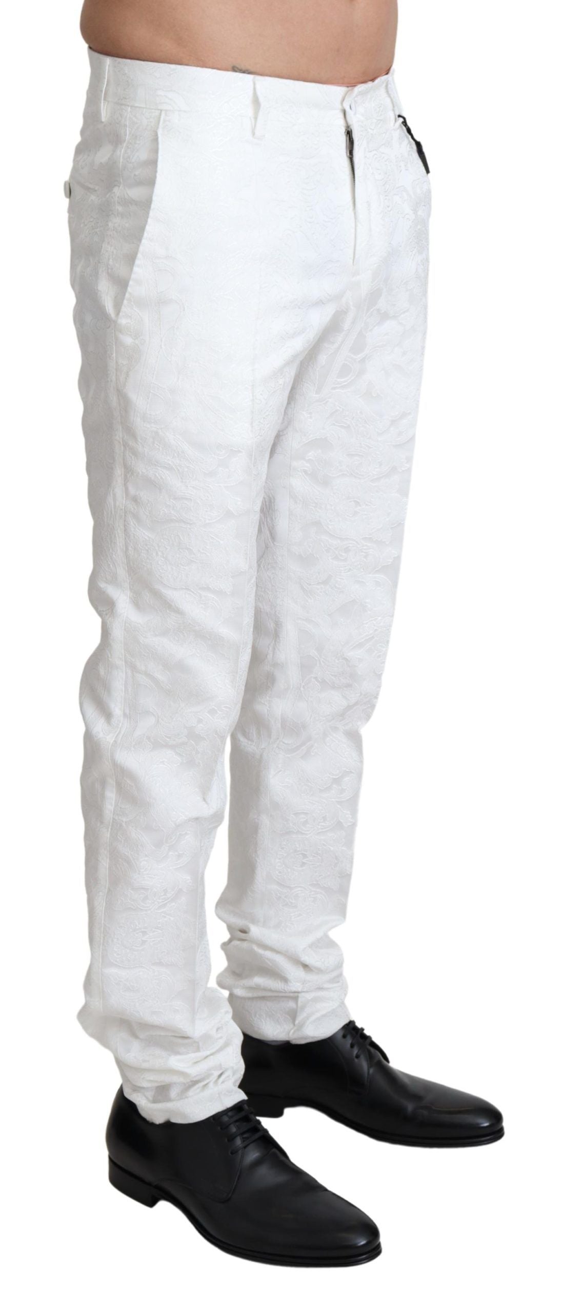White brocade trouser pants with a textured pattern, featuring a high waist and slim fit