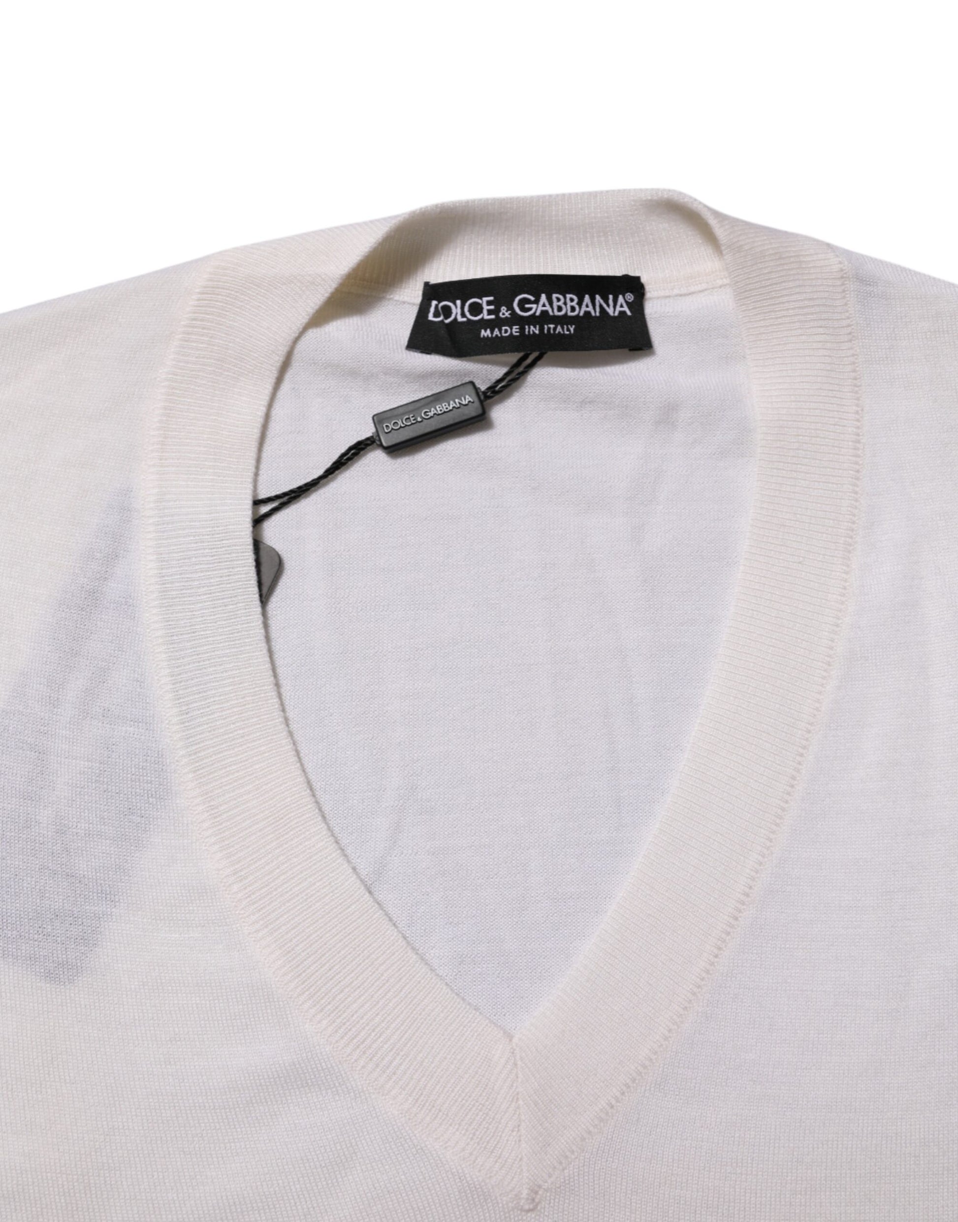 Tan sweater on hanger