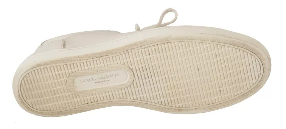 A single white casual leather sneaker with a logo on the side, designed for men