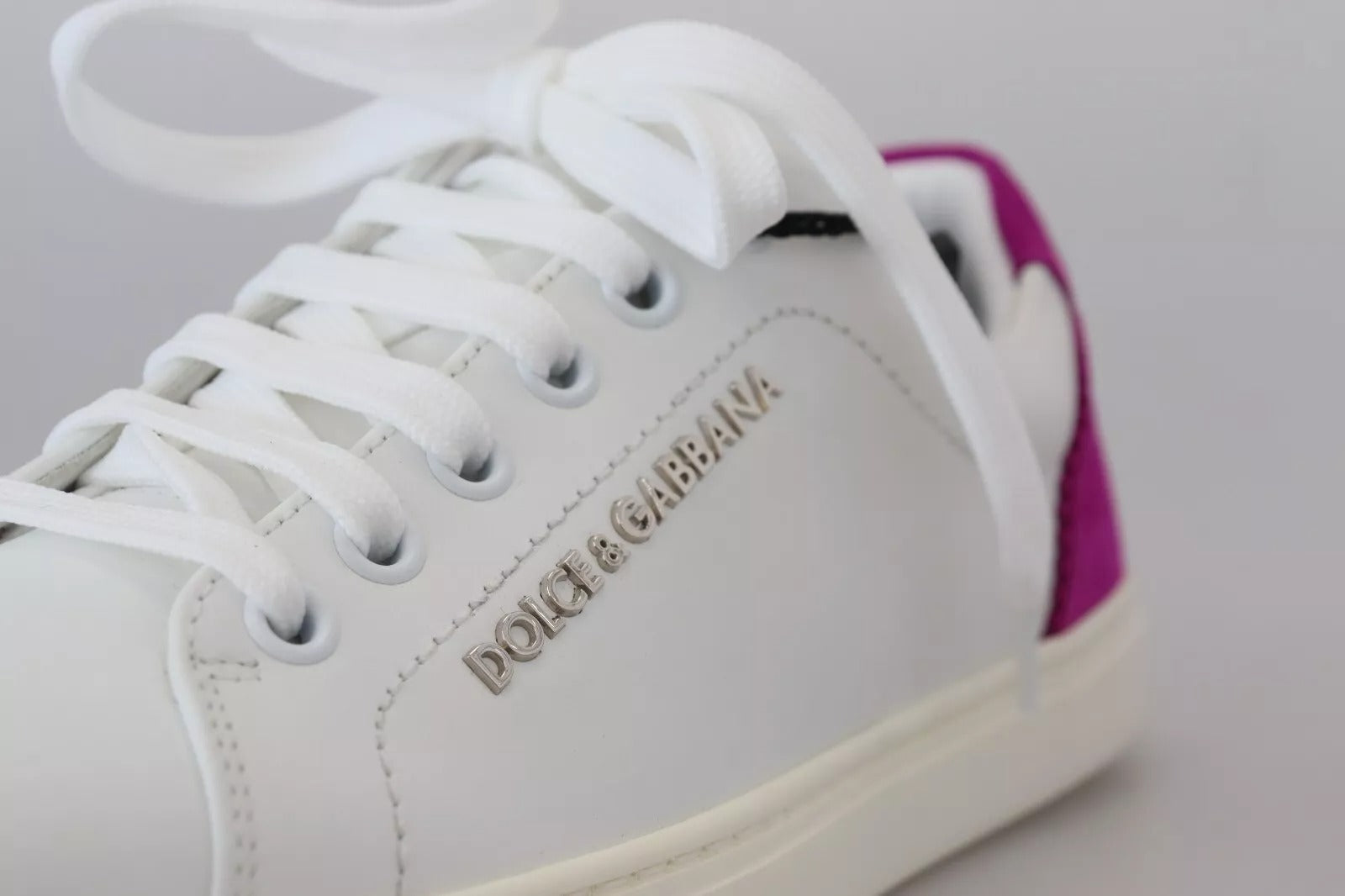 White sneakers with purple accents