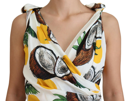 A sleeveless, white coconut print sheath dress with a V-neckline