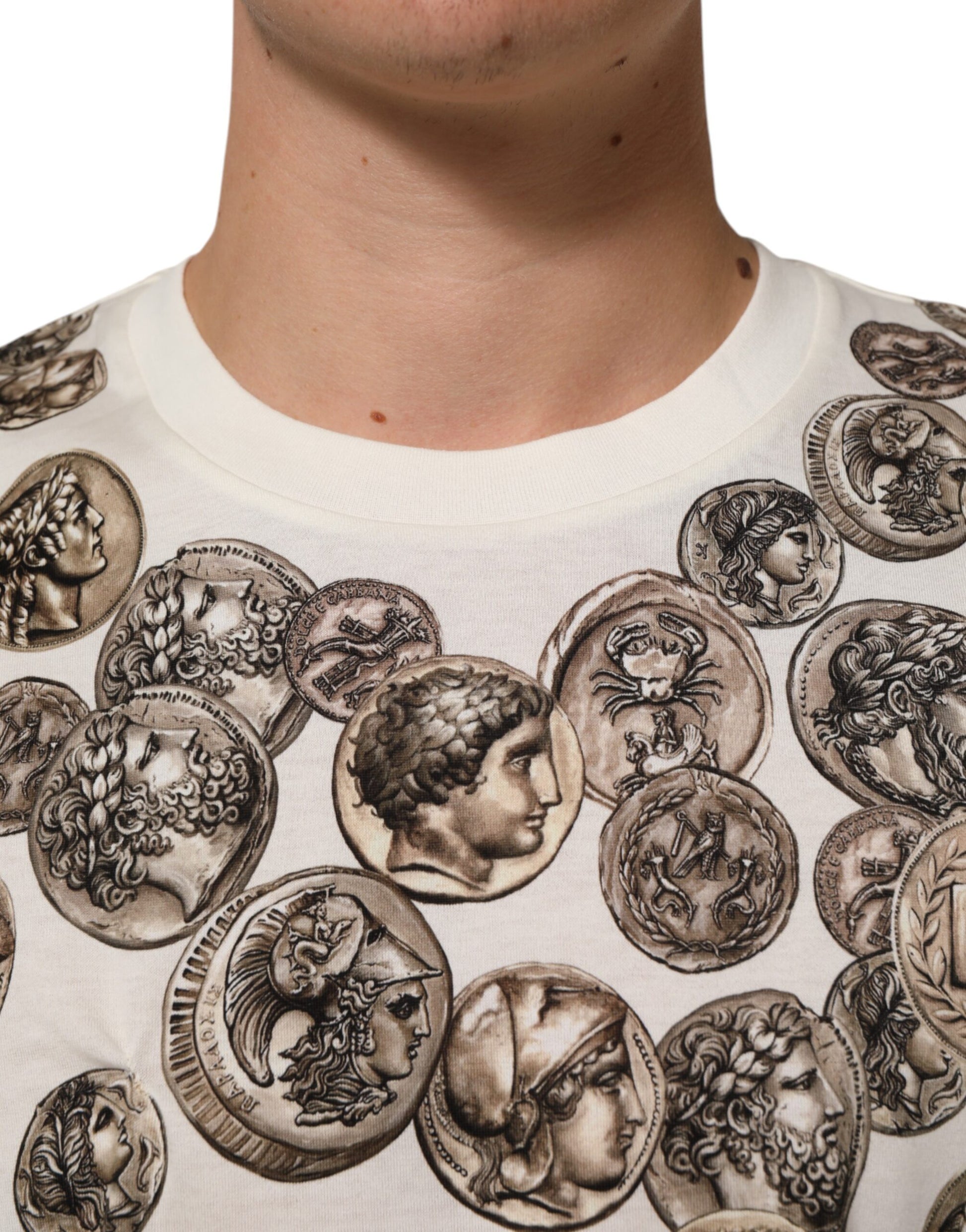 The shirt has a pattern of coins on it