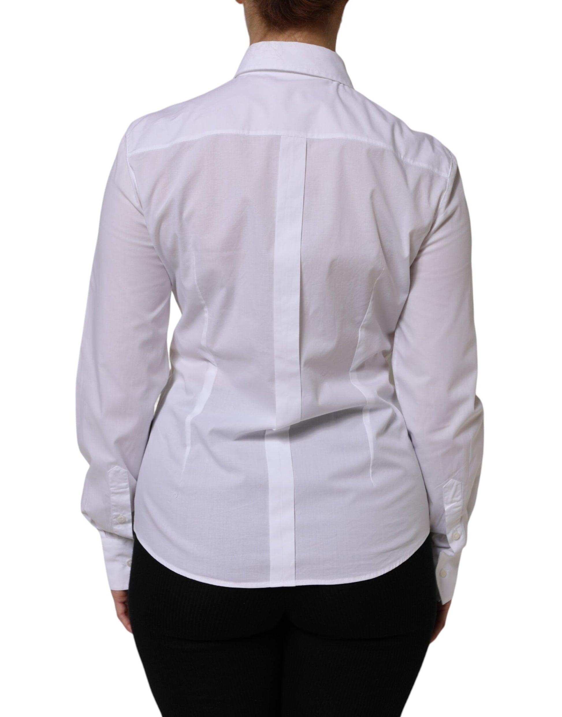 A white collared long sleeve dress shirt top