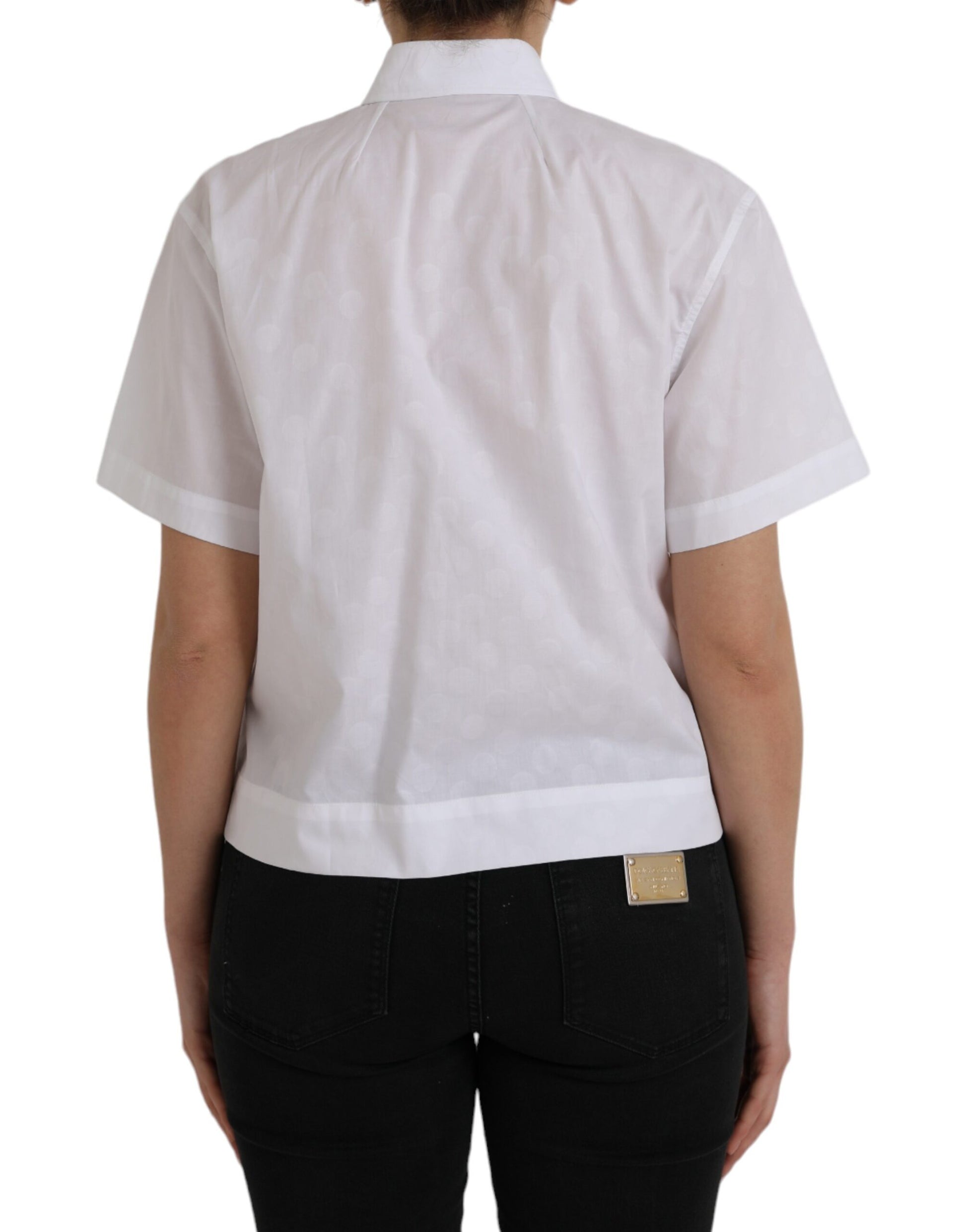 White short sleeve shirt with black pants