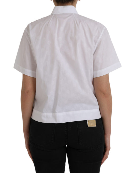 White short sleeve shirt with black pants