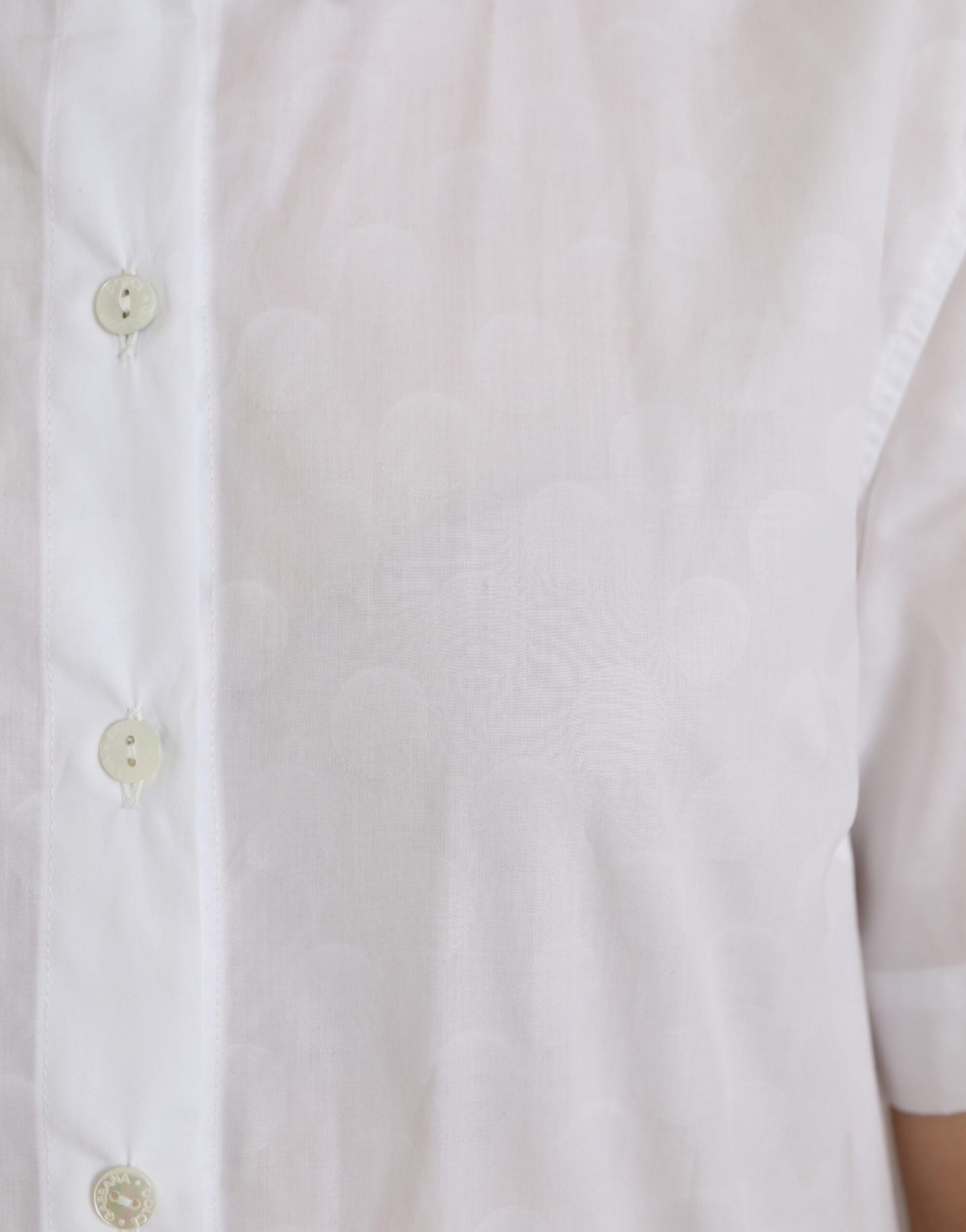 White button up shirt with two visible buttons