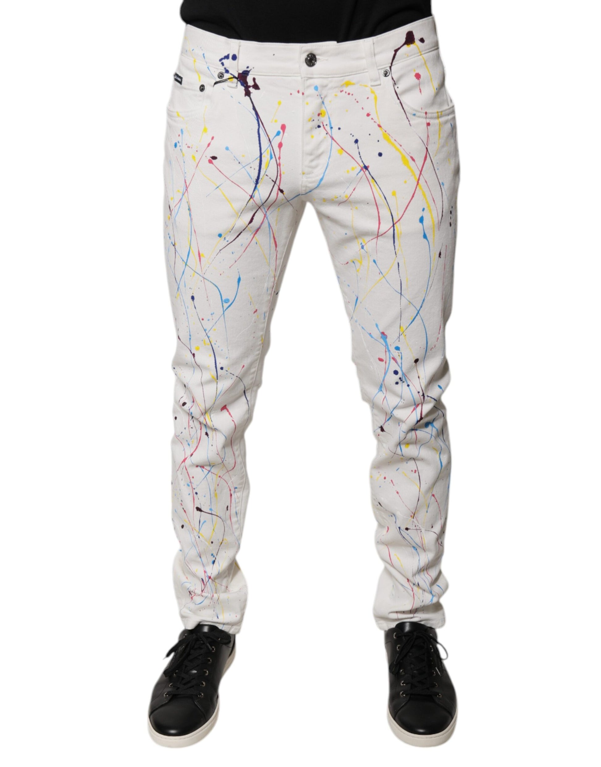 Pair of white jeans with colorful splatter paint design