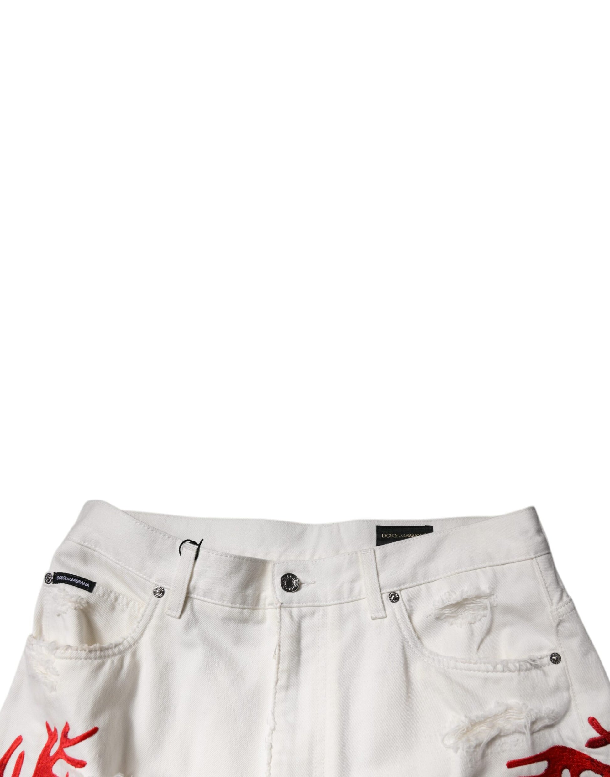 White denim shorts with red stitching details
