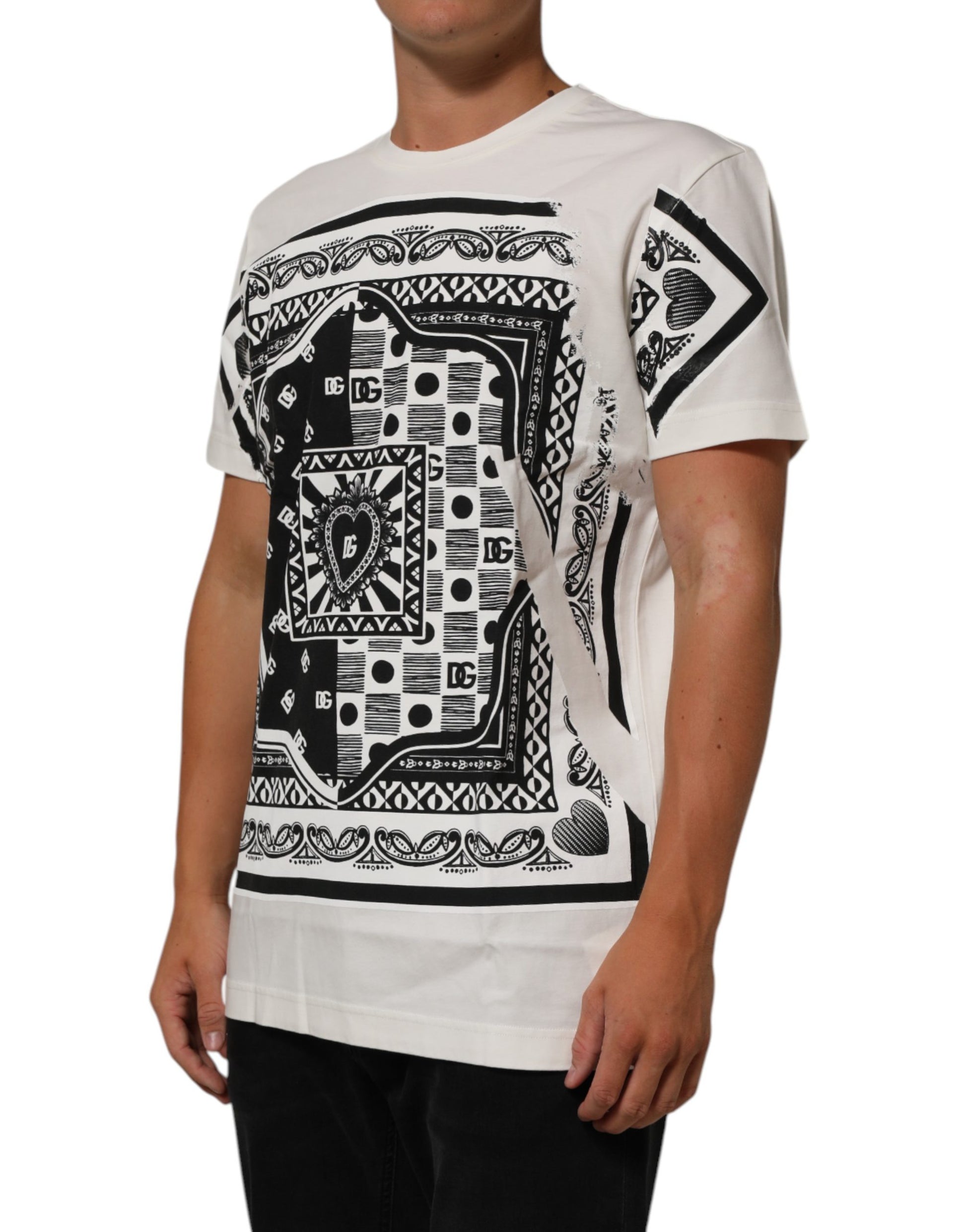 Man wearing white t-shirt with black tribal design