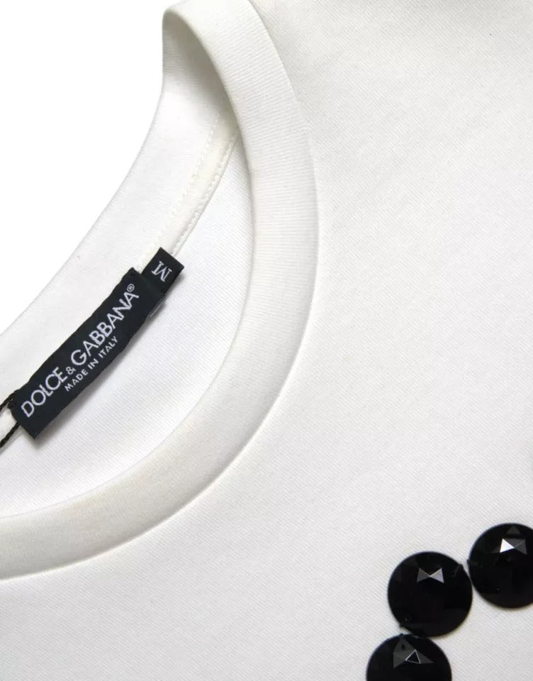 White t-shirt on hanger with black label