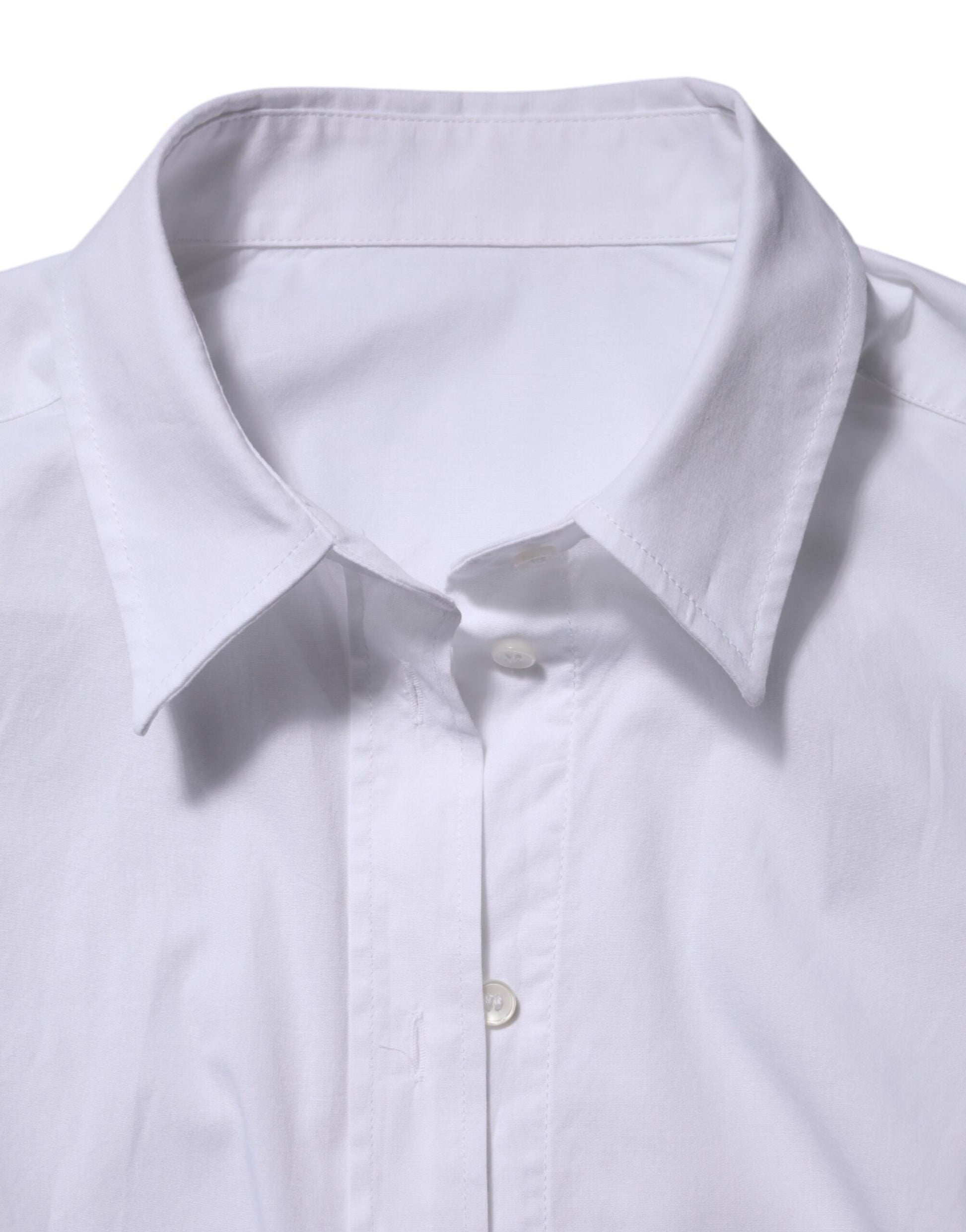 A white cotton collared button-up shirt top