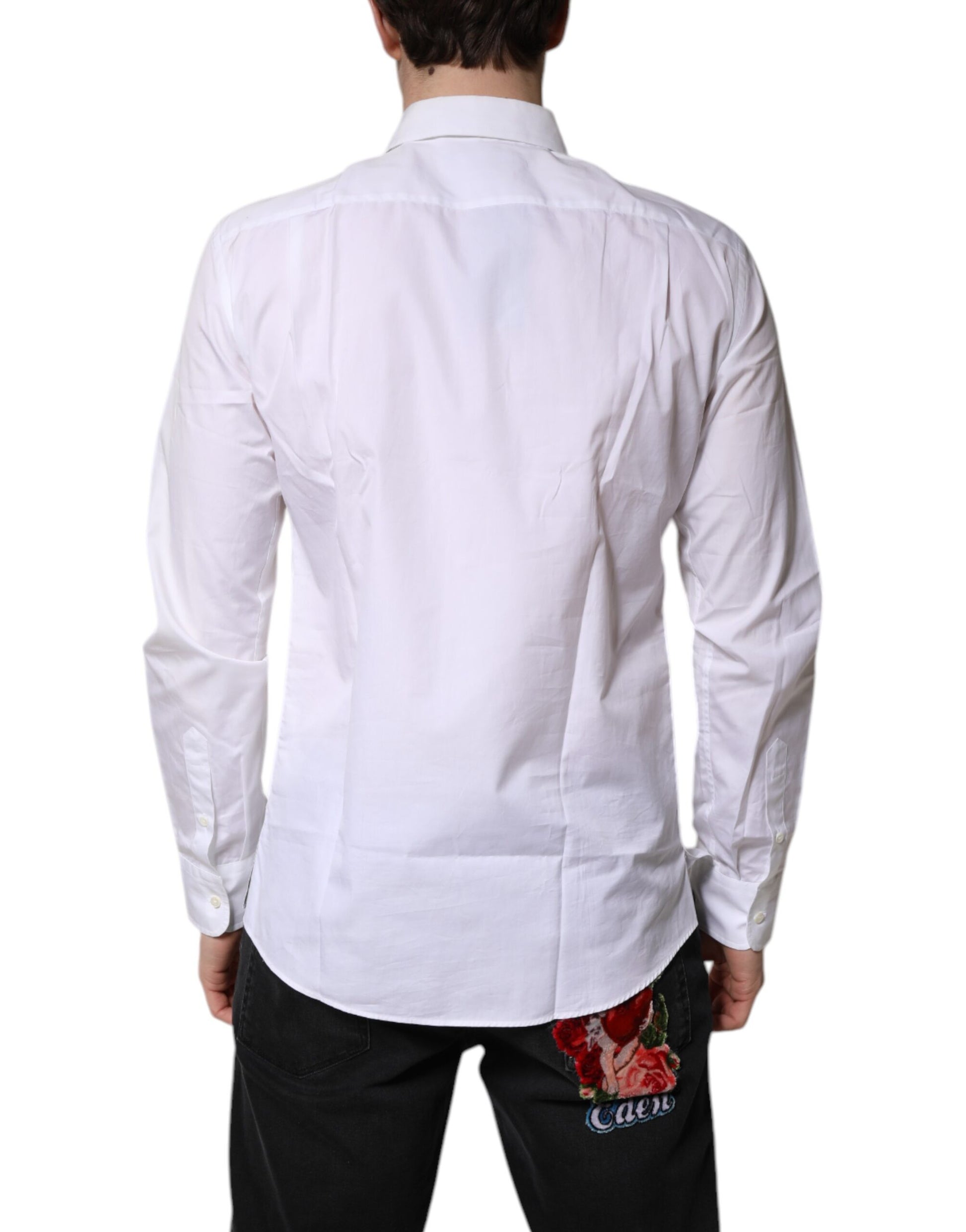 A white collared dress shirt with a floral embroidered detail on the back