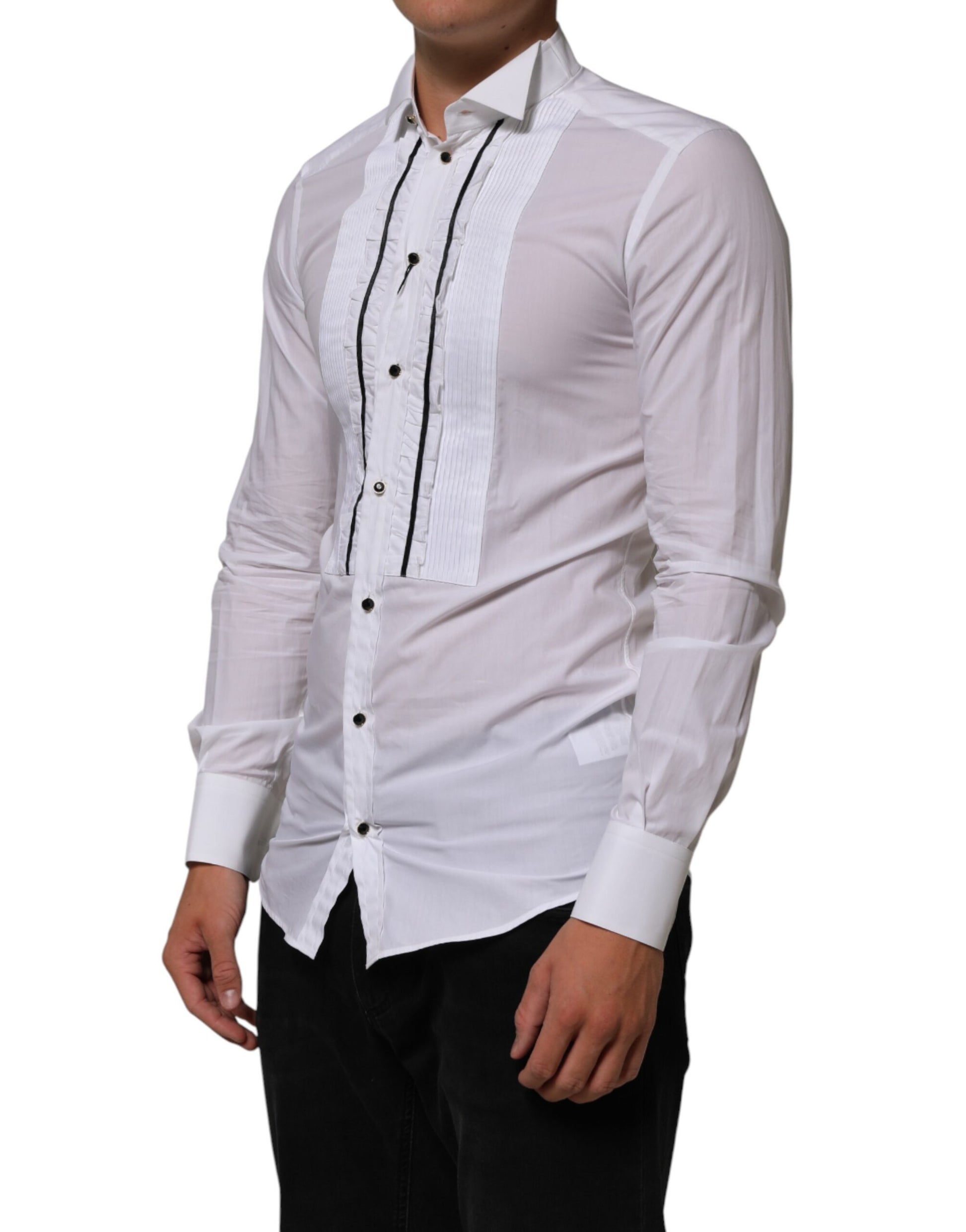 A mannequin wearing a white cotton collared long sleeve shirt with gold buttons