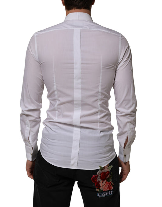 A white cotton collared long sleeve shirt with gold detailing