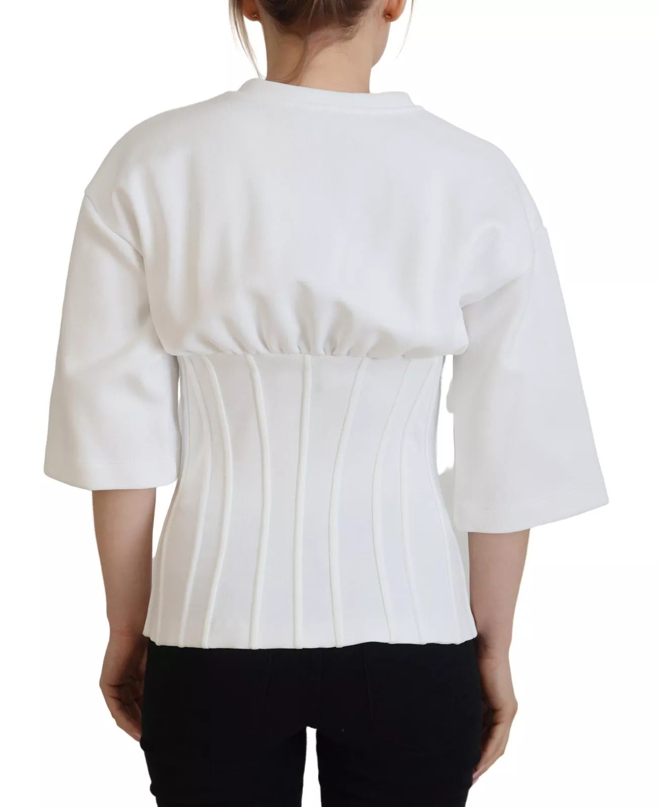 White backless top on a woman