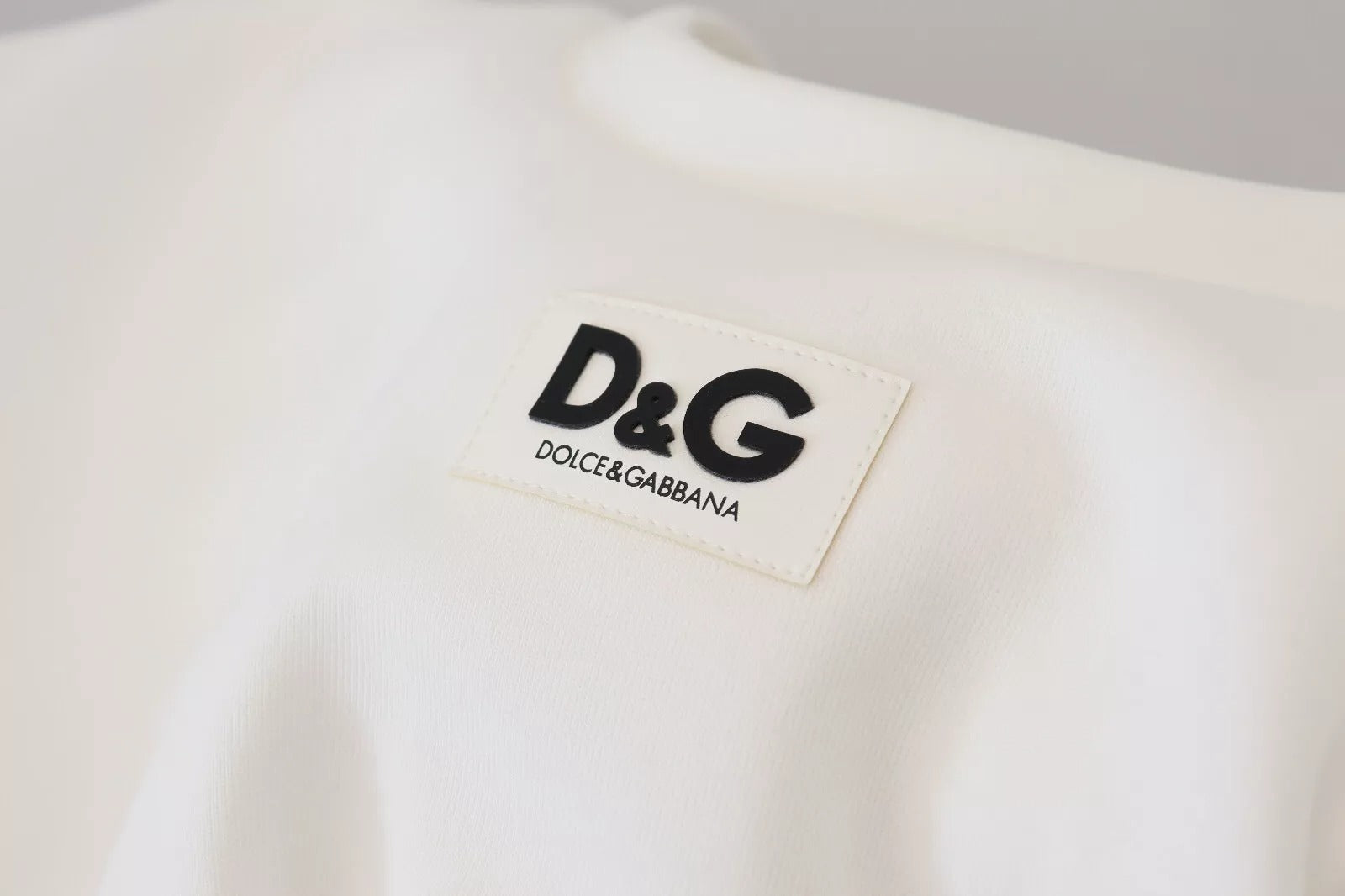 White t-shirt with black logo