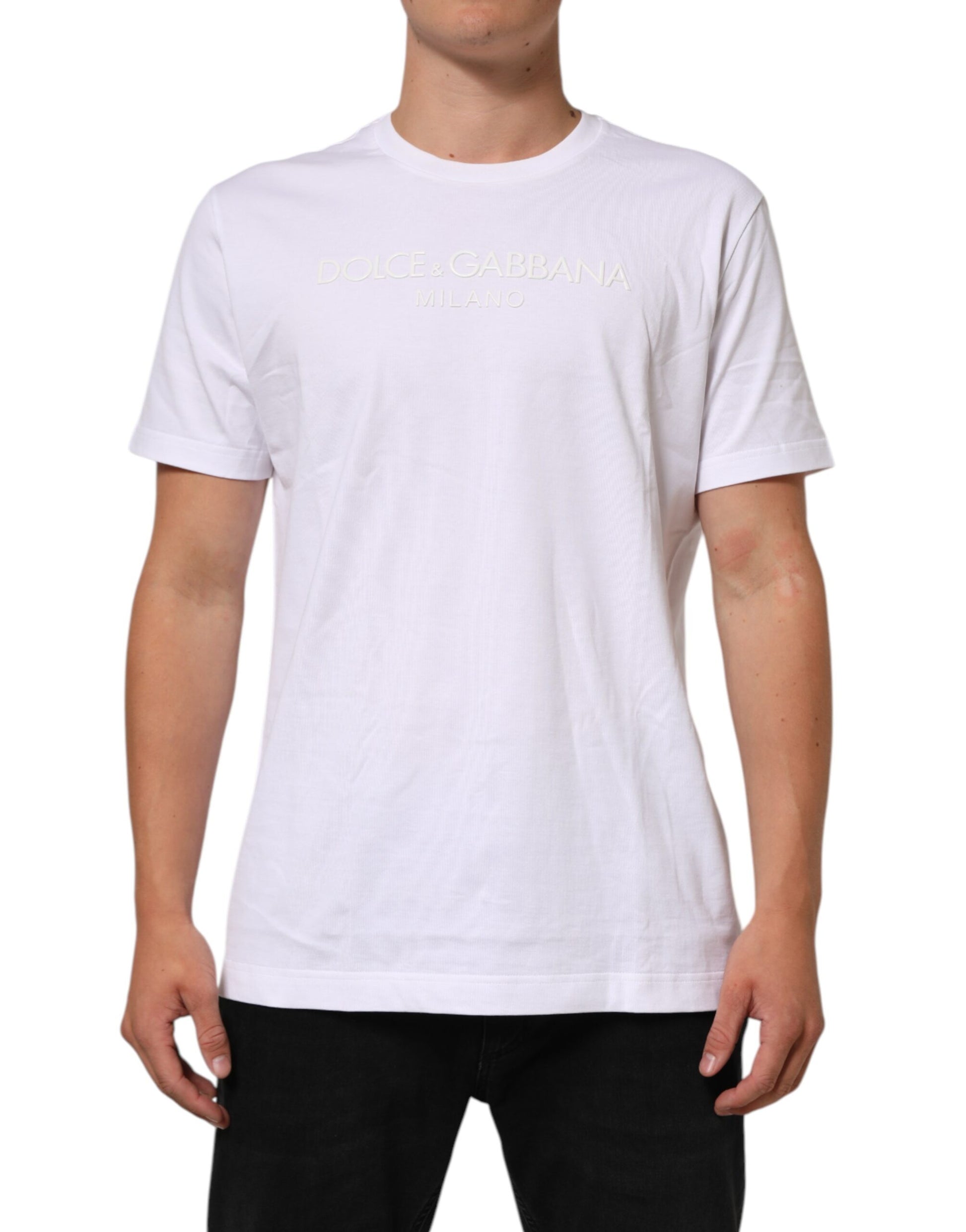 White t-shirt with gold lettering on front