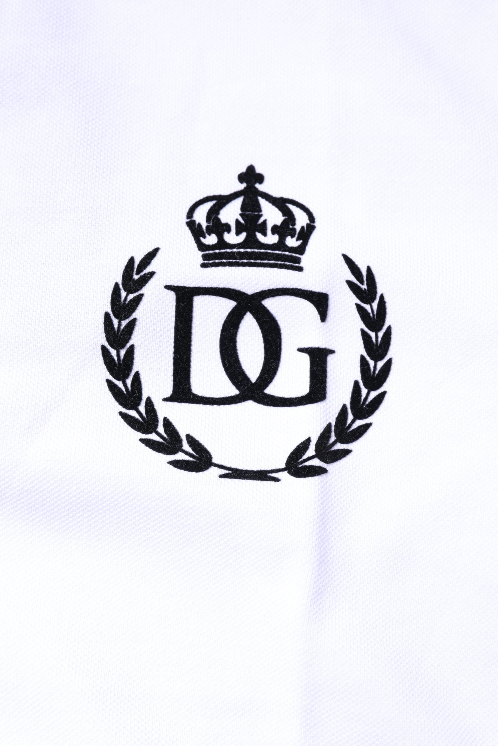White towel with black embroidered logo