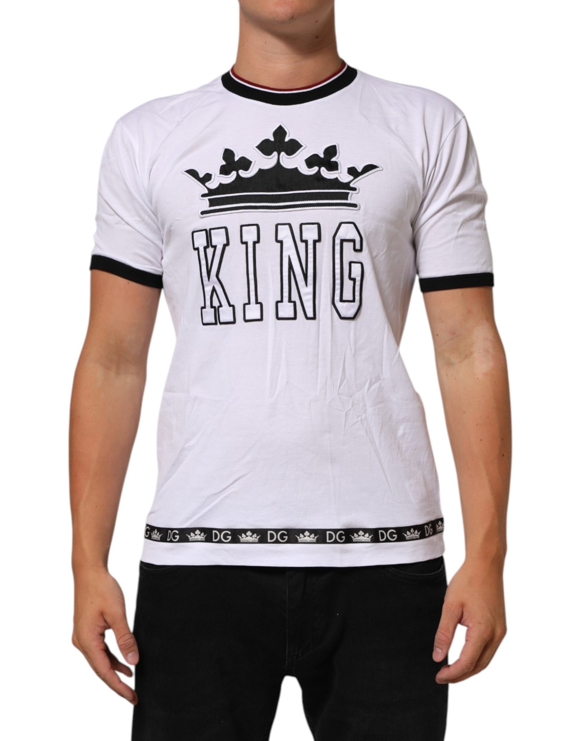 White t-shirt with "KING" printed in black letters