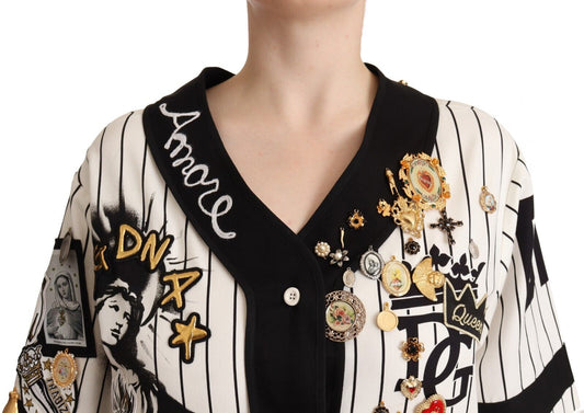 Black and white striped sweater with various pins and patches on front