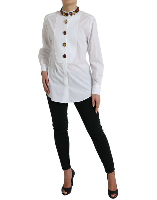Woman wearing white shirt with black pants and heels