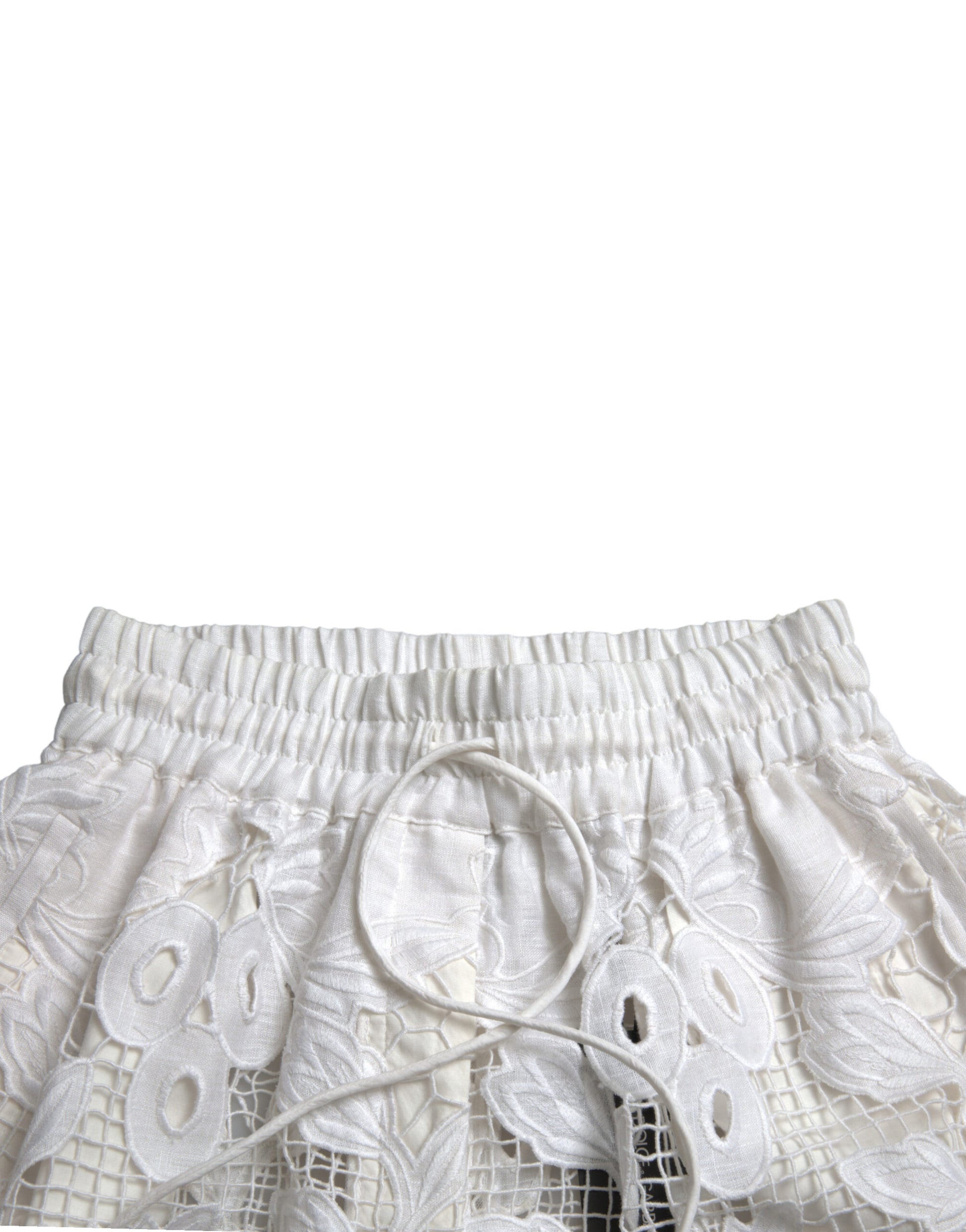 White lace skirt with ruffles on hem