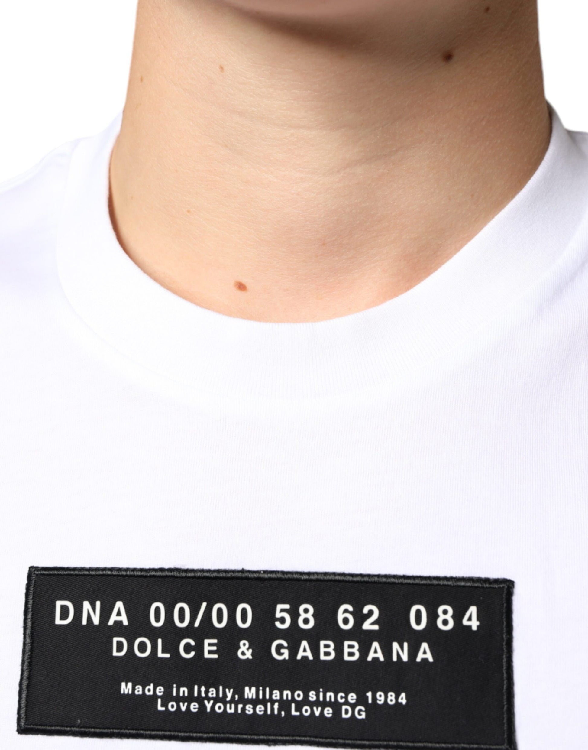 White t-shirt with black text on neckline