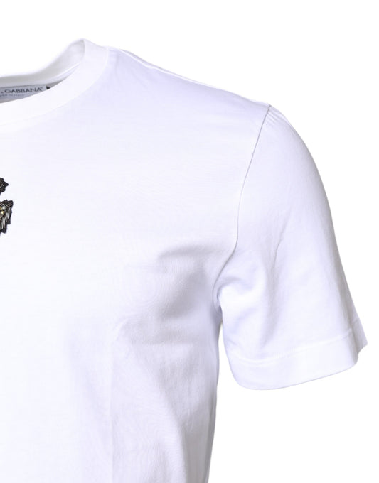 White short sleeve t-shirt with a small graphic on the left chest area