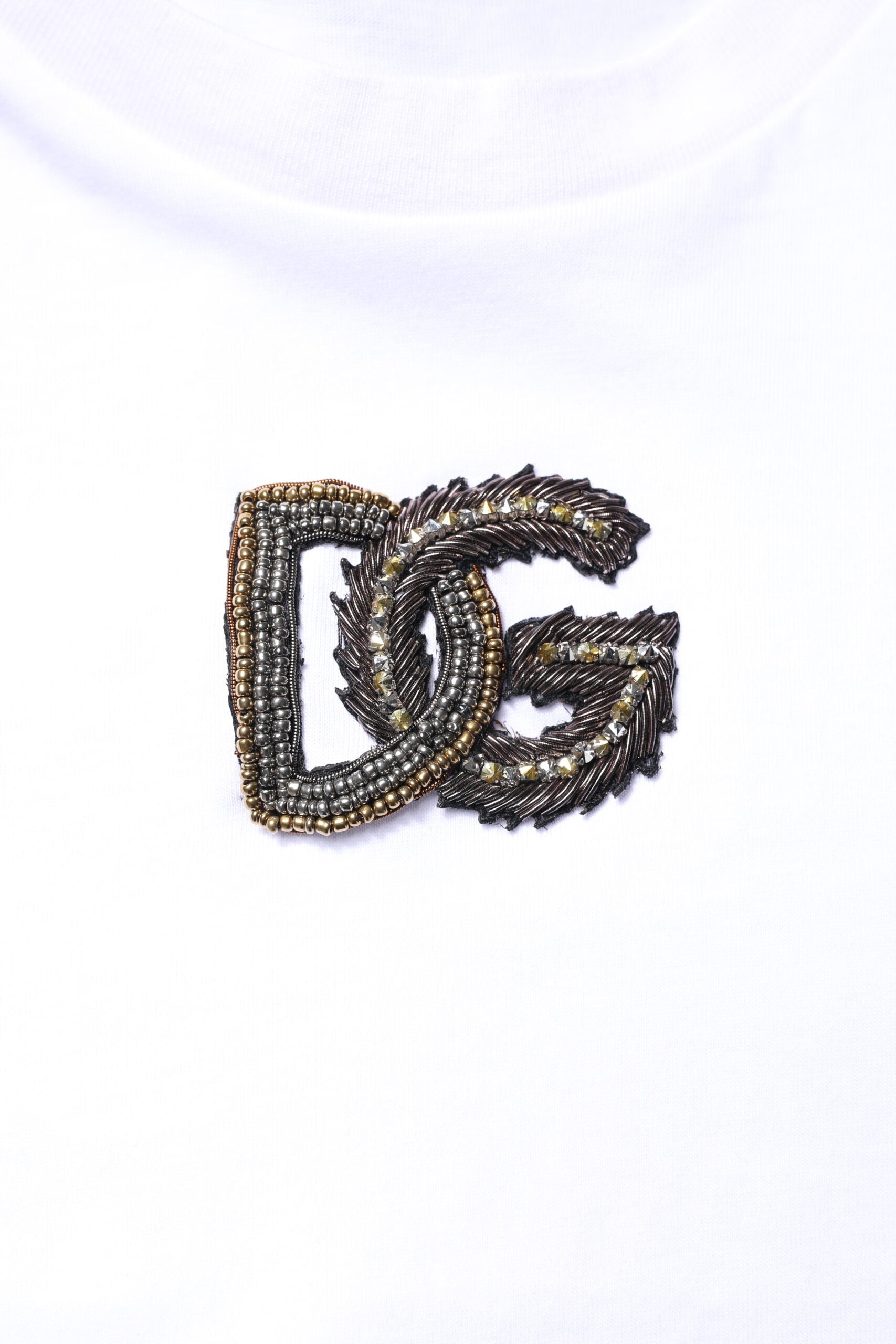 Embroidered logo on white fabric