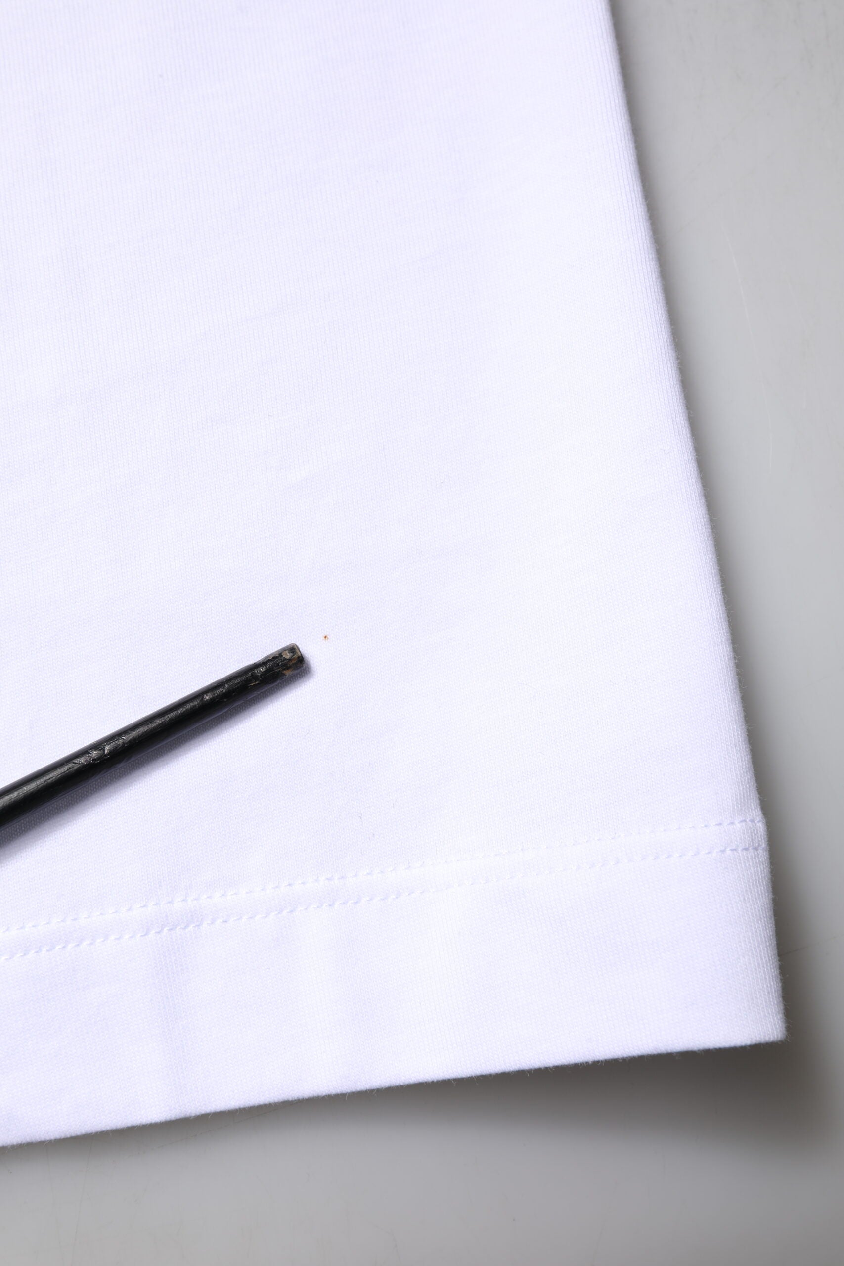 Black pen on white napkin
