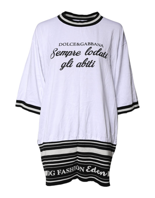 Long sleeve white shirt with black lettering and stripes at cuffs and hem